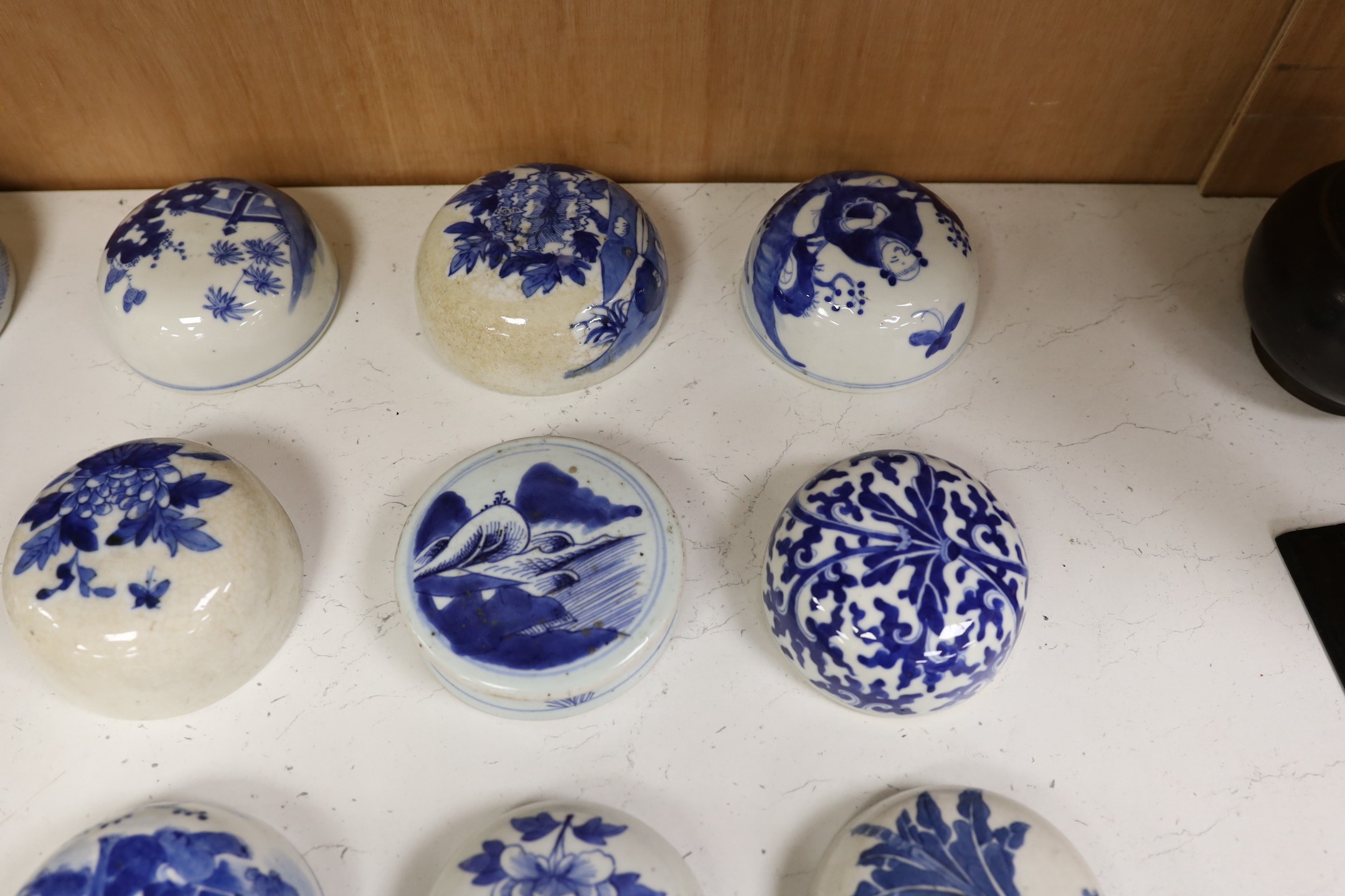 Fifteen 18th/19th century Chinese blue and white jar covers, largest 13.3cm diameter, Provenance - D.C.Monk & Son, former dealers based in Kensington Church Street, London W8